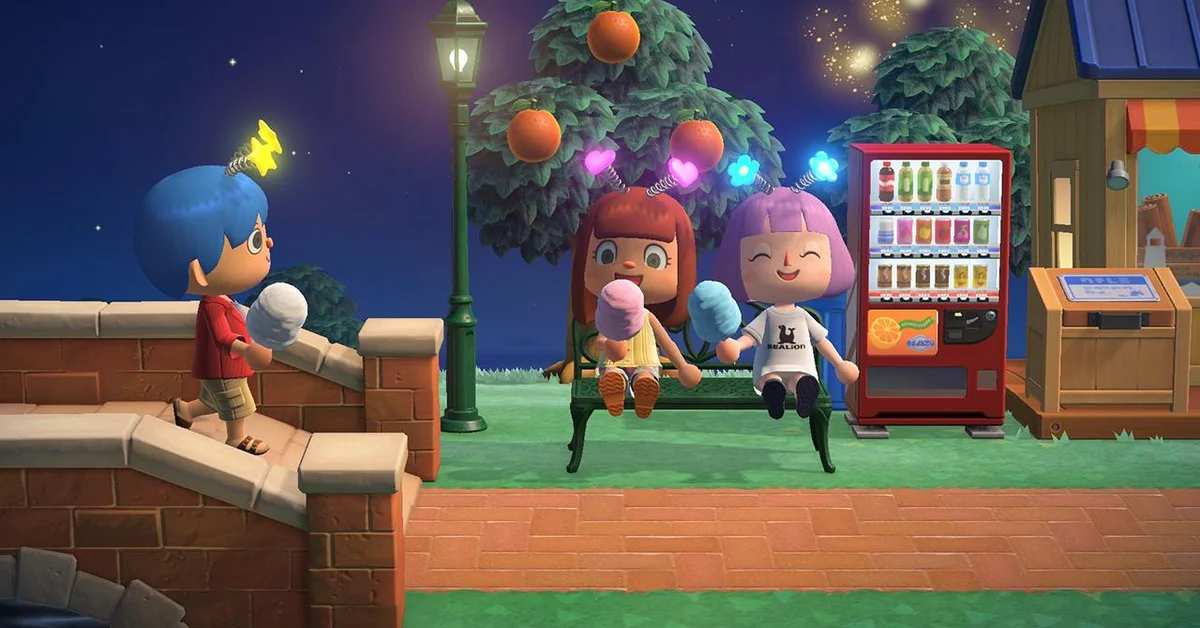 Three islanders with glowing headbands eating cotton candy by a bench and vending machine during a nighttime fireworks show in Animal Crossing New Horizons
