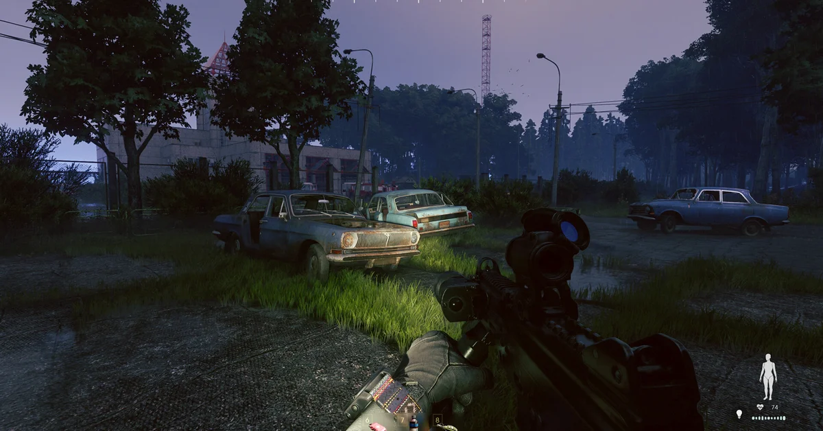 A player aiming at abandoned cars in a dusky overgrown lot in Active Matter
