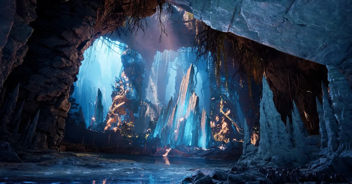 Official AION 2 screenshot of a glowing blue crystal cavern with jagged stalagmites and a still underground pool