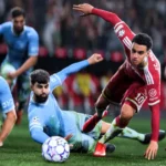 Players contesting a loose ball in EA Sports FC 27