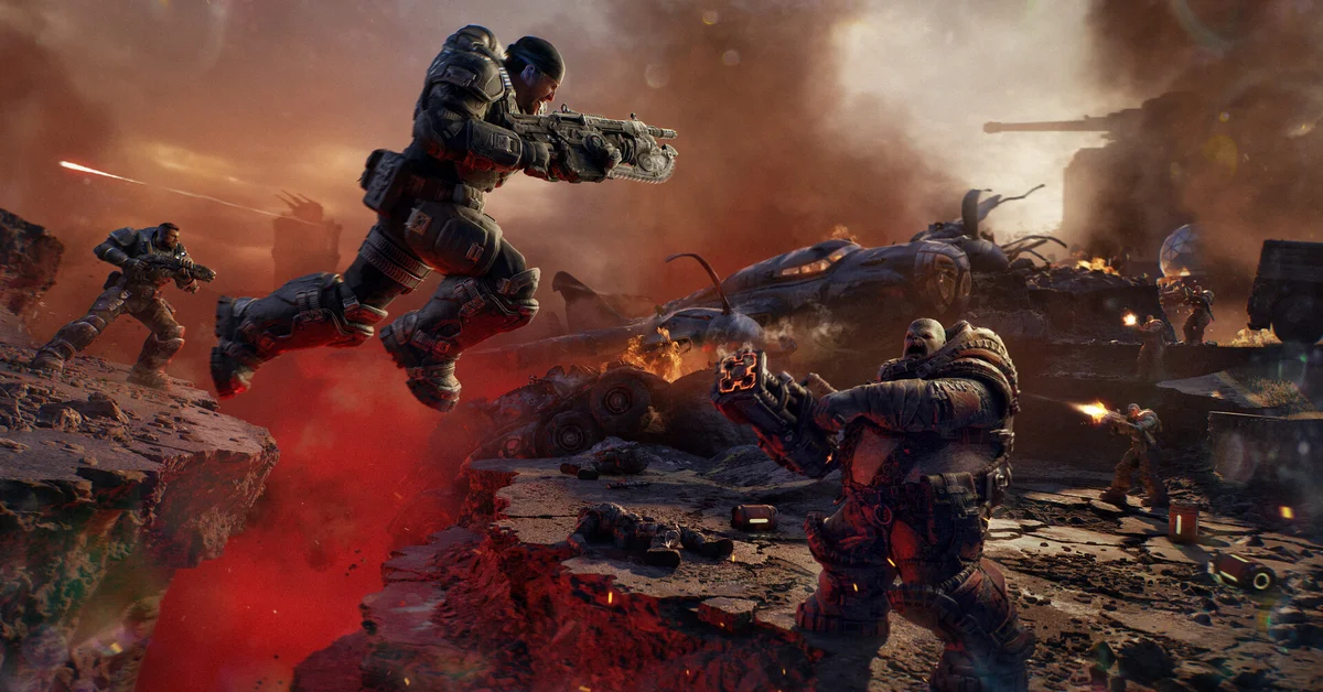 COG soldiers leap across a burning, cratered battlefield firing Lancers at the Locust in Gears of War E-Day