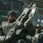 Marcus Fenix raises a Lancer in front of a stadium scoreboard as a COG soldier looks on in Gears of War E-Day