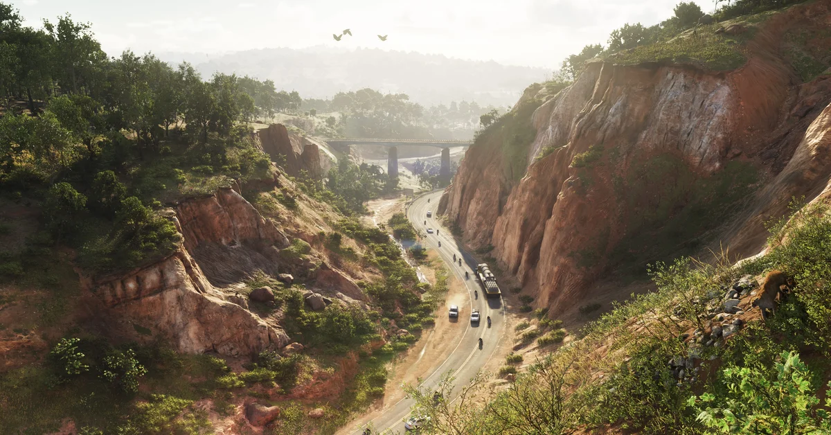 A highway winds through a wooded canyon toward a bridge in Mount Kalaga National Park in Grand Theft Auto VI