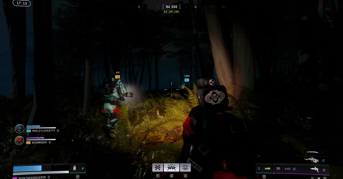 Marathon runners moving through a dark forest with a flashlight lighting up ferns