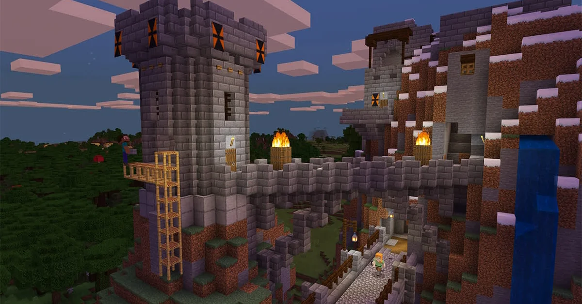 A player walks along a cobblestone path toward a stone brick castle tower with scaffolding and fires burning on wooden posts at dusk in Minecraft