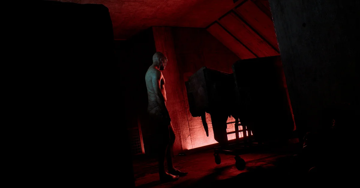 A pale figure standing in a red-lit attic room in Silent Hill Townfall