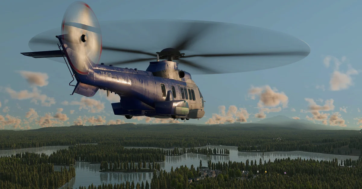 A large blue helicopter flying over a lake and forest in Transport Fever 3
