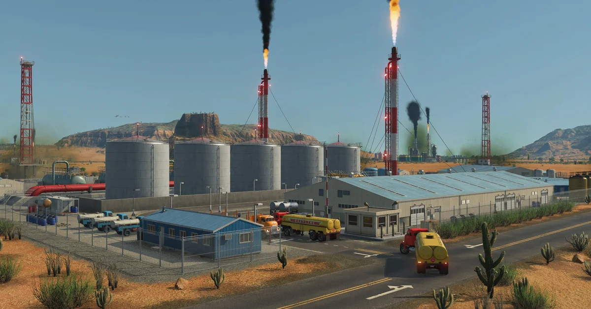An oil refinery with storage tanks and trucks in a desert landscape in Transport Fever 3
