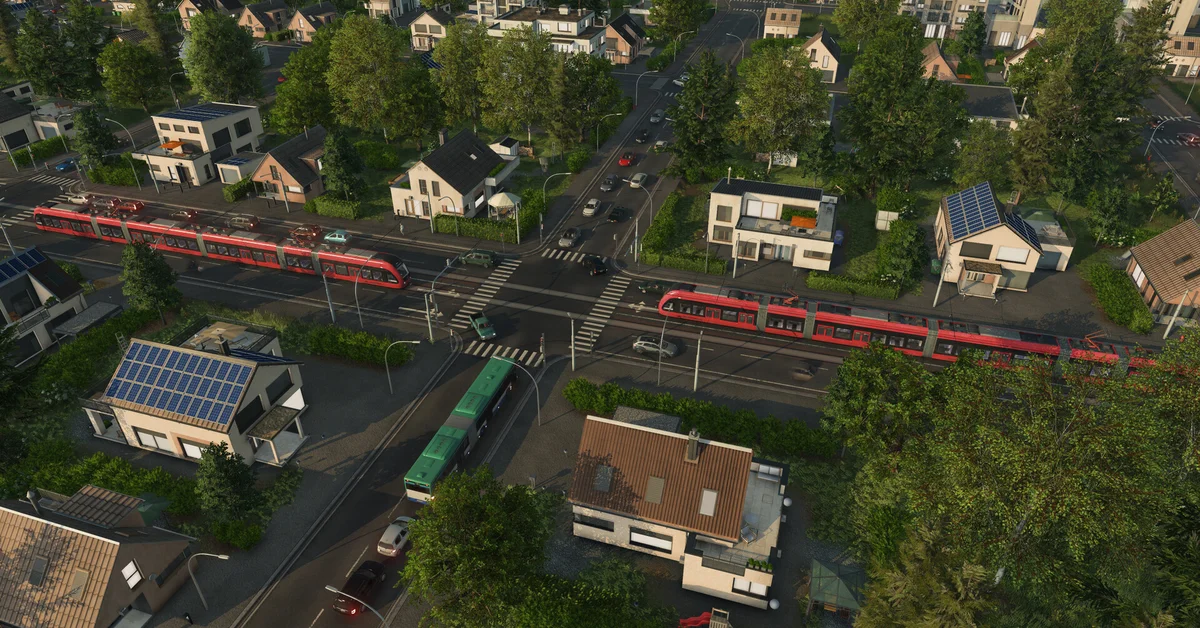 Aerial view of a suburban town in Transport Fever 3 with red commuter trains and a green bus