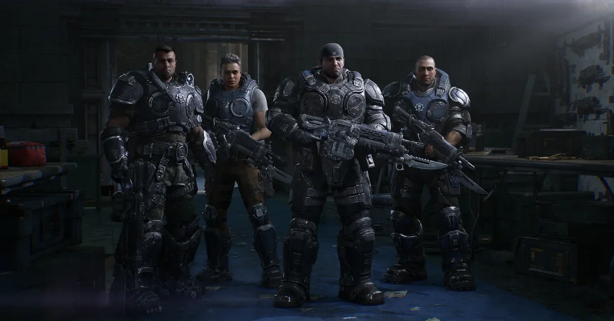 Four COG soldiers holding Lancer rifles in Gears of War E-Day