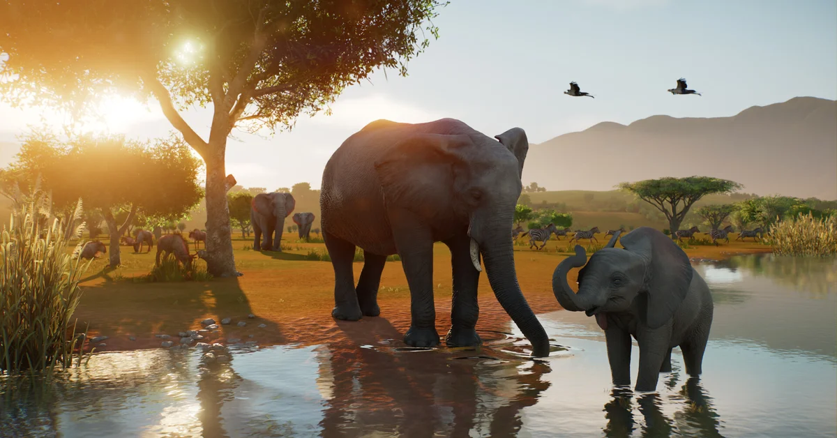 Elephants at a watering hole in Planet Zoo 2