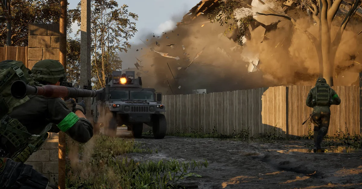 A WARDOGS soldier fires a rocket launcher at a Humvee as an explosion blows through a wooden fence