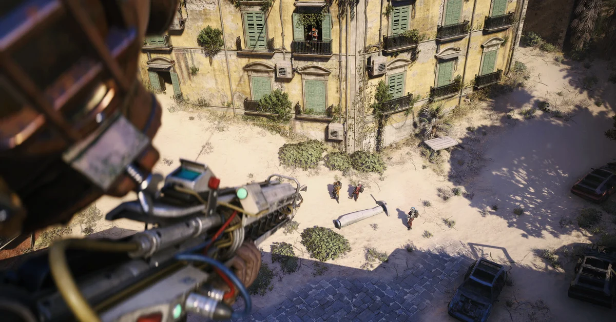An ARC Raiders player looks down from a rooftop at raiders scavenging in a sun-baked ruined town