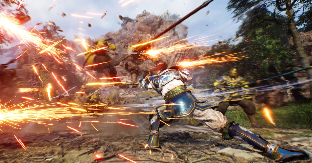Zhao Yun in blue and white armor cuts through soldiers in a shower of sparks in Dynasty Warriors 3 Complete Edition Remastered