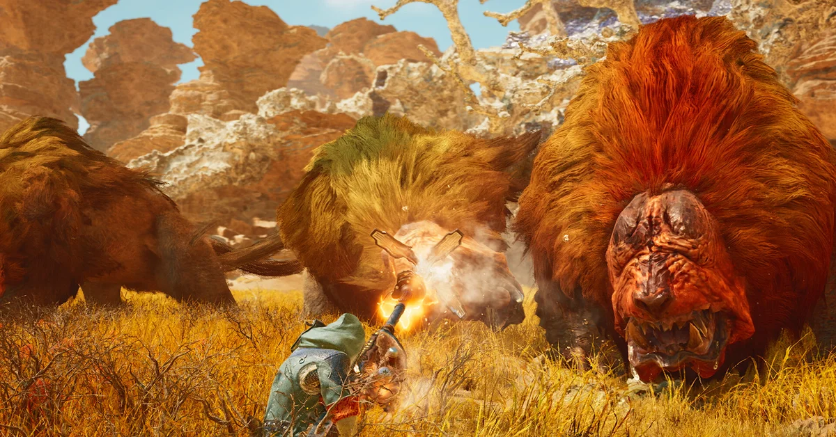 A hunter fires at a huge red-maned monster on golden grassland in an official Monster Hunter Wilds screenshot