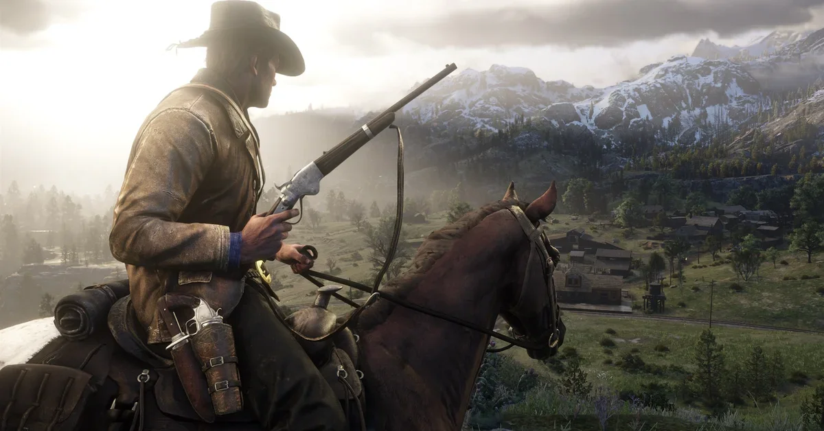 Arthur Morgan on horseback holding a rifle, looking down over a green valley below snowy mountains in Red Dead Redemption 2