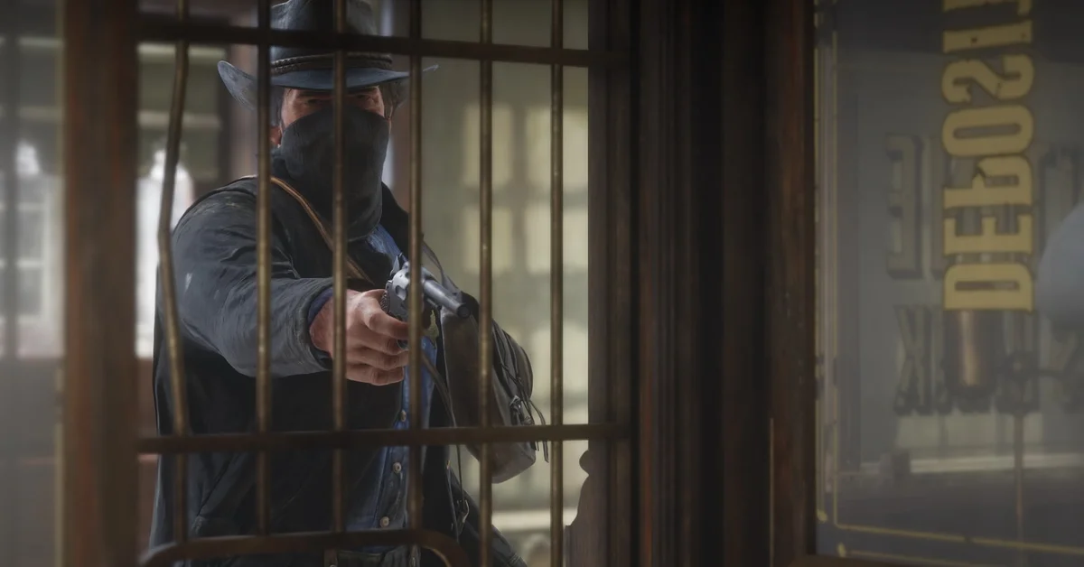 A masked outlaw aiming a revolver through the bars of a bank teller's cage in Red Dead Redemption 2
