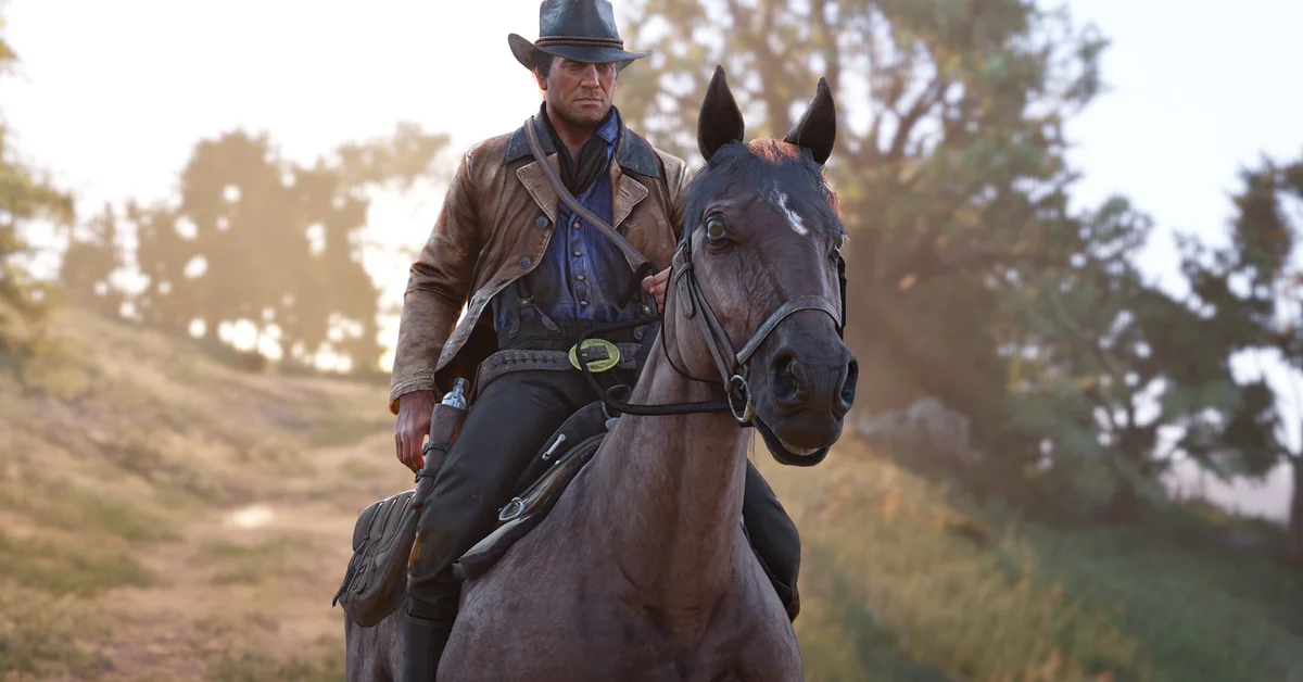 Arthur Morgan riding a dark grey horse along a sunlit dirt trail in Red Dead Redemption 2